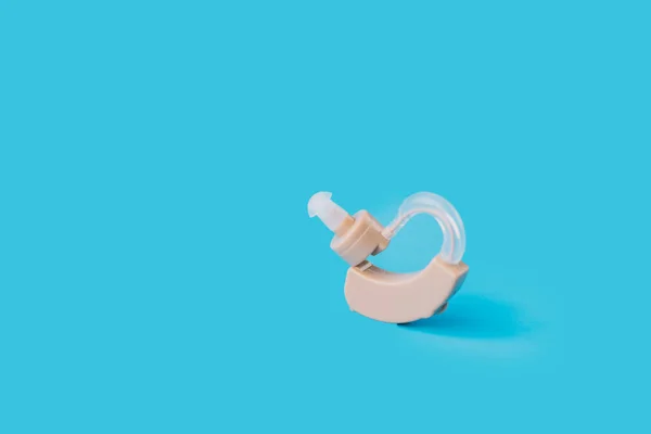 Hearing Aid Middle Blue Background — Stock Photo, Image