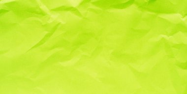 Açık yeşil renkli, buruşmuş kağıt zeminli uzun afiş.