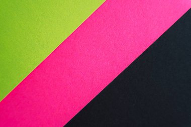 Çapraz kireç yeşili, pembe ve siyah kağıt şeritleri. Yüksek kalite fotoğraf