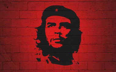 Tuğla bir duvara Che Guevara 'nın portresi.