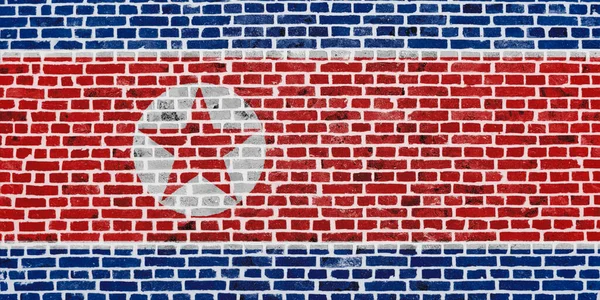 Close Een Bakstenen Muur Met Daarop Vlag Van Noord Korea — Stockfoto