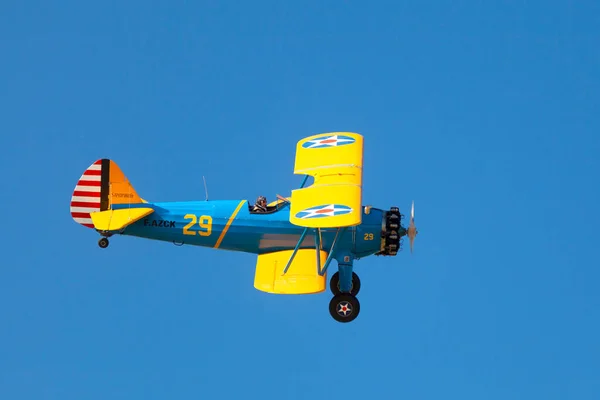 stock image Morlaix, France - September 18 2022: The Stearman Model 75 is a biplane formerly used as a military trainer aircraft.