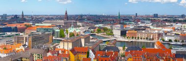 Copenhagen, Denmark - June 28 2019: Aerial view of the city with many landmarks: Copenhagen City Hall, Christiansborg Palace, Borsen, St. Nicholas Church