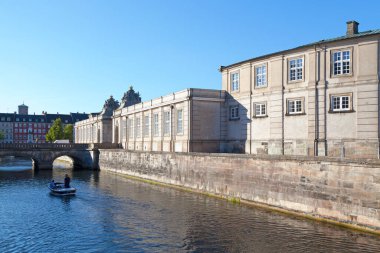 Copenhagen, Denmark - June 28 2019: The Marble Bridge (Danish: Marmorbroen) connects Christiansborg Riding Ground Complex on Slotsholmen, to Ny Vestergade.