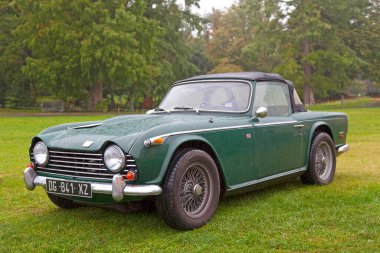 Lamorlaye, France - October 06 2019: The Triumph TR5 is a sports car built by the Triumph Motor Company in Coventry, England, between August 1967 and September 1968.
