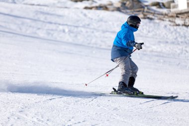 Pas de la Casa, Andorra, December 03 2019: Skier on the ski slope of Grandvalira, the largest ski resort in the Pyrenees and southern Europe.