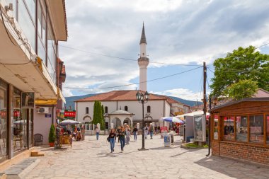 Skopje, North Macedonia - May 20 2019: Street on the old town heading to Murat Pasha Mosque.