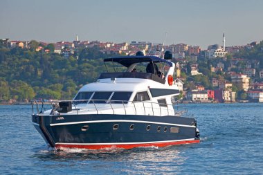 Istanbul, Turkey - May 11 2019: Boat crossing the Bosphorus.