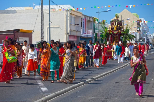 stock image Saint-Denis, La Reunion - August 10 2014: Procession of worshippers during a Tamil religious holiday. The devotees are walking down the rue du General Leclerc in Saint-Denis in direction to the Shri Maha Kali temple.