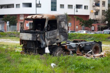Cab-over truck burnt by a pyromaniac.