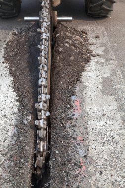 Asphalt cutting machine slicing up a section of the road in Krasnoyark, Russia.