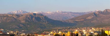 Panoramic view of Podgorica, capital of Montenegro with behind, the Dinaric Alps.