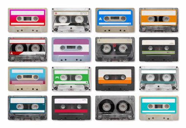 Full-frame close-up on 16 audio cassettes isolated on white background.
