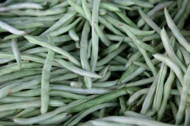 Stack of Green Beans on a market stall.