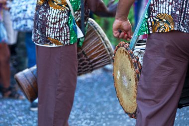 Two percussionists playing during the carnival of the Grand Boucan.