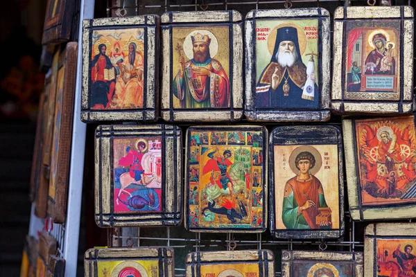 Religious icons for sale in a market stall in old town Varna, Bulgaria.
