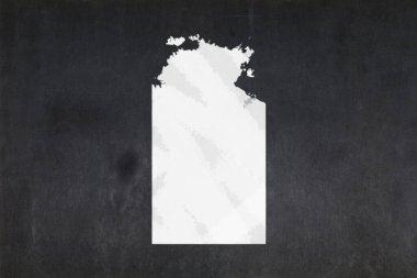 Ortasına Kuzey Bölgesi (Avustralya) haritası çizilmiş bir karatahta.