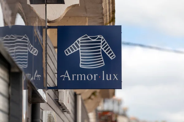 stock image Carhaix, France - May 01 2023: Sign of Armor-Lux, a French company specializing in the design, manufacture and distribution of clothing, in particular marinieres and knitwear.