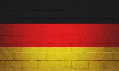 Almanya bayrağı tuğla duvara boyanmış..