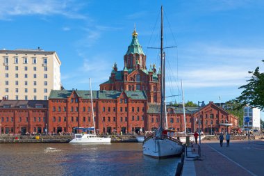 Helsinki, Finland - June 18 2019: The Uspenski Cathedral is an Eastern Orthodox cathedral dedicated to the Dormition of the Theotokos (the Virgin Mary). clipart