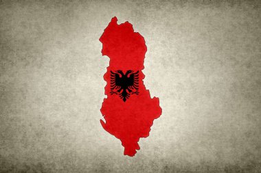 Sınırı içinde bayrağı eski bir kağıda basılmış Grunge Arnavutluk haritası.
