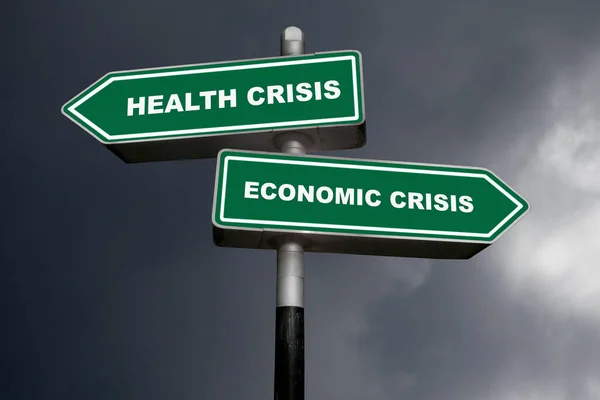Two direction signs, one pointing left (Health crisis), and the other one, pointing right (Economic crisis).