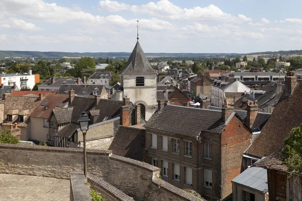 stock image Gaillon, France - August 05 2022: Aerial view of the bell tower of the Saint-Ouen church overlooking the rest of the village