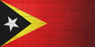 Doğu Timor 'un bayrağı tuğla duvara boyanmış..