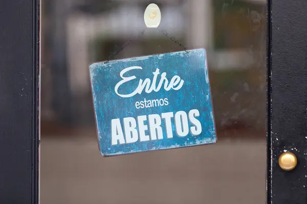 stock image Open sign with written in it in Portuguese: 