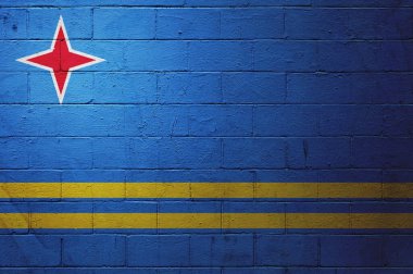 Tuğla duvarda Aruba bayrağı.