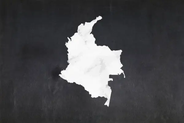 stock image Blackboard with a the map of Colombia drawn in the middle.