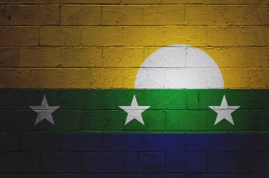 Flag of Nueva Esparta painted on a cinder block wall. clipart