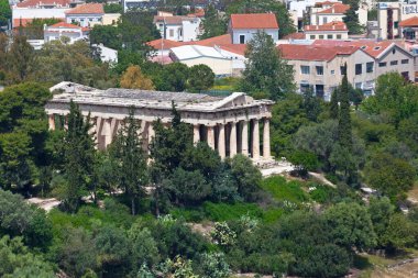 Athens, Greece - April 28 2019: Aerial view of the Temple of Hephaestus or Hephaisteion, a well-preserved Greek temple near the Acropolis. clipart