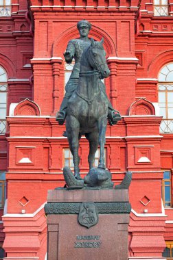 Moscow, Russia - July 07 2018: Monument to Marshal Zhukov opposite the Historical Museum. Sculptor Vyacheslav Klykov portrayed the Marshal at the time of receiving the parade in honor of Victory in the great Patriotic war. clipart