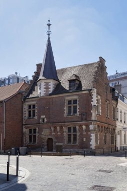 Valenciennes, France - June 22 2020: The provost's house (French: Maison du Prevot) is one of the oldest buildings in Valenciennes. Built around 1485, it is mainly made of red brick with a sandstone base. clipart