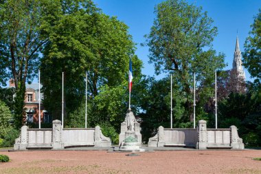 Valenciennes, France - June 22 2020: Monument to the dead of the 1914-1918 war inaugurated in November 1924. It was created by the architect Henri Armbruster and the sculptor Elie Raset. clipart