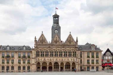 Saint-Quentin, France - June 10 2020: Completed in 1509, the Saint-Quentin City Hall was built in the flamboyant Gothic style. clipart