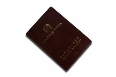 Beyaz arka planda izole edilmiş Kolombiya pasaportuna yakın plan..