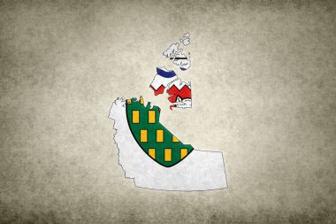 Kuzeybatı Toprakları 'nın (Kanada) Grunge haritası. Sınırında bayrağı eski bir kağıda basılmış.