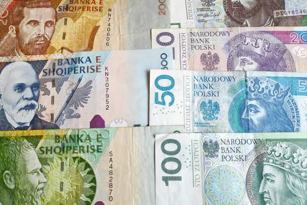 stock image Close-up on a stack of Albanian Lek and Polish Zloty.