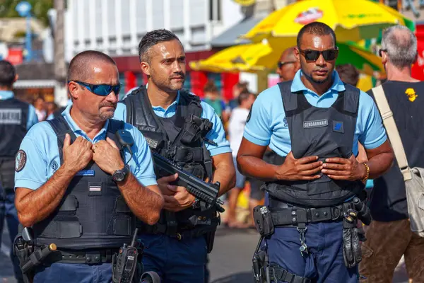 stock image Saint-Gilles les bains, La Reunion - June 25 2017: Patrol of gendarmes during the carnival of the Grand Boucan.