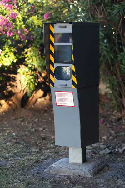 Stock image An automatic radar alongside a busy road