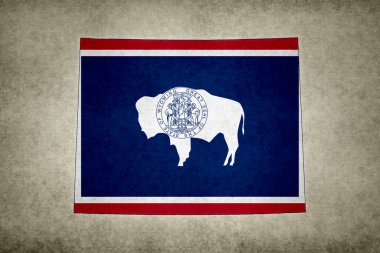 Wyoming eyaletinin (ABD) eski bir kağıda bayrağı basılmış Grunge haritası.