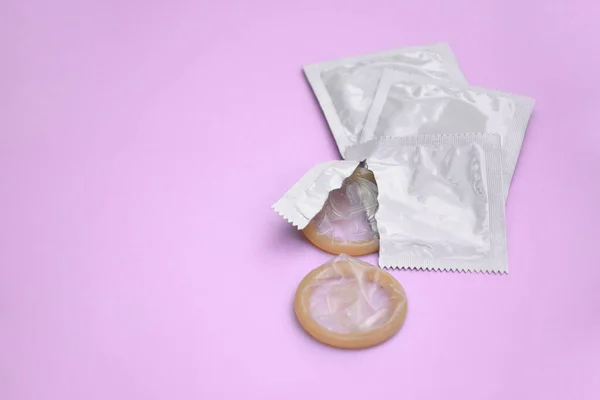 Many White Packages Unopened Condoms Pink Background Using Condom Reduce — ストック写真