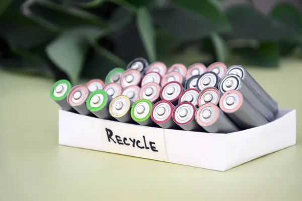 Used Batteries Proper Disposal Environmentally Soil Toxic Batteries Green Background — Stock Photo, Image