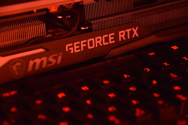 UKRAINE, KHARKIV, Kasım 14, 2022: MSI Geforce RTX 3090 Ti oyun X Trio grafik kartı, koyu arkaplan. PC ya da madencilik platformu kurmak için donanım bileşenleri.