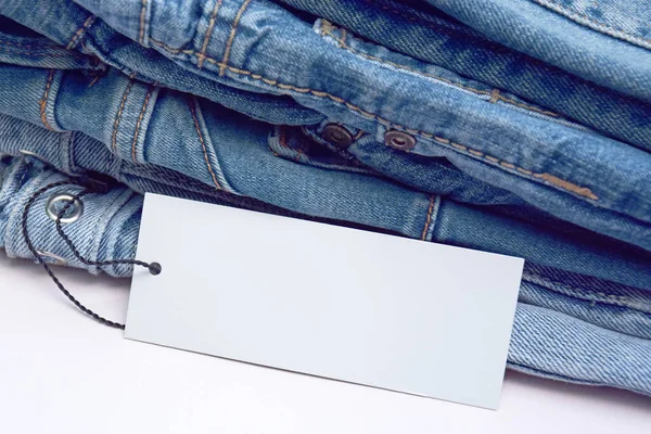 Banyak Celana Jeans Dalam Tumpukan Latar Belakang Penolakan Konsep Pembelian — Stok Foto