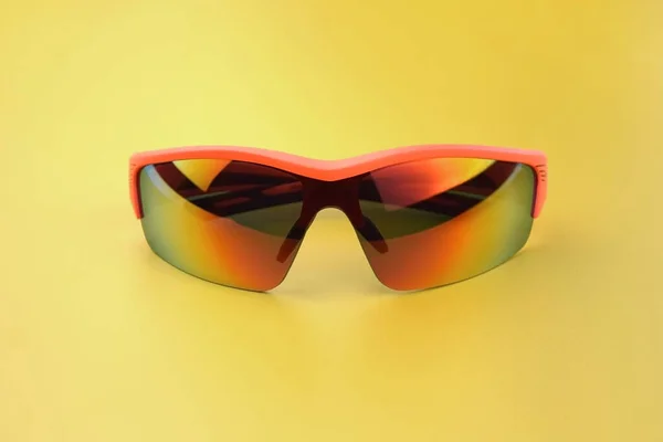Sports Goggles Made Orange Plastic Yellow Lenses Shot Yellow Background — Stock Photo, Image