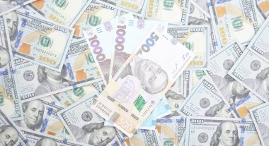 Amerikan Doları ve Ukrayna Hryvnia 'sı. Savaşta Ukrayna 'ya Amerikan yardımı kavramı. Döviz kuru kavramı.