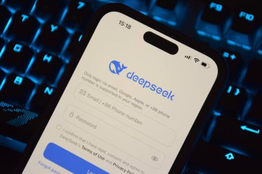 Kharkiv, Ukraine - January 28, 2025: Deepseek Ai logo is displayed on smartphone. clipart